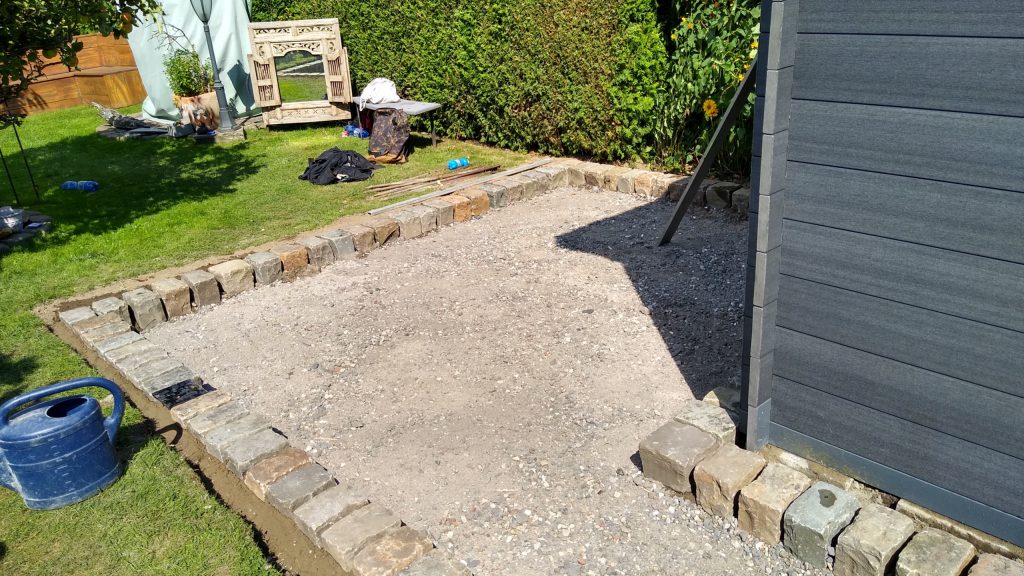 Herstellung eines Sitzplatzes aus Natursteinpflaster in Moers